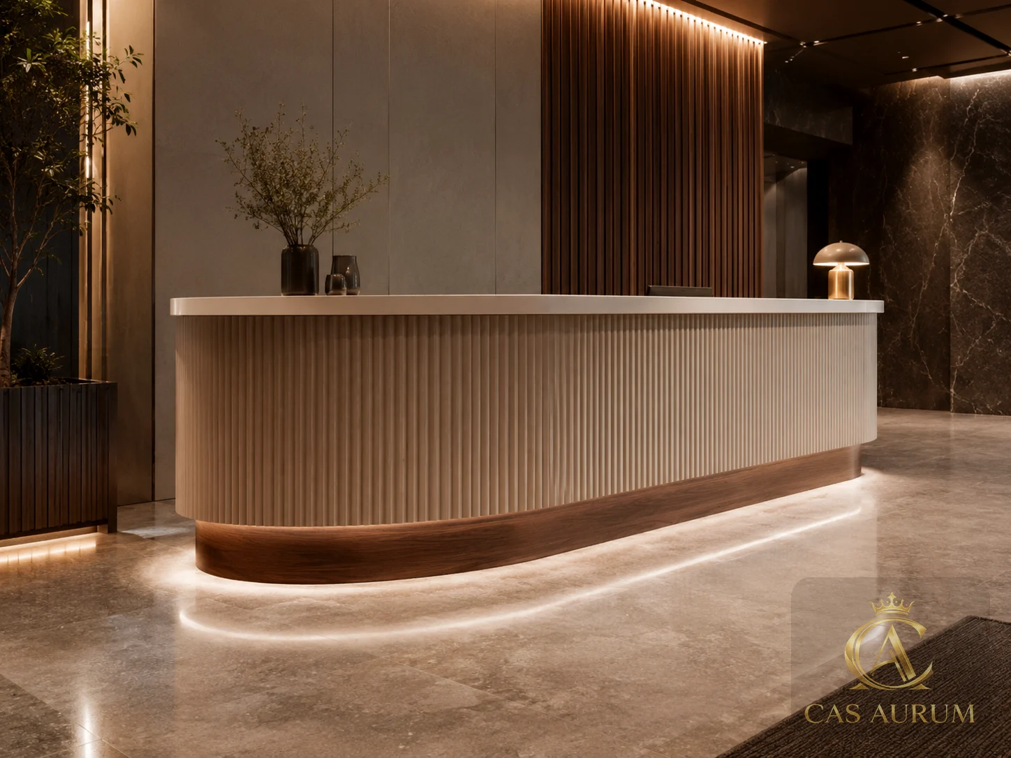 Fluted reception desk with stone top, warm wood base, integrated lighting and refined reception millwork by CAS AURUM.
